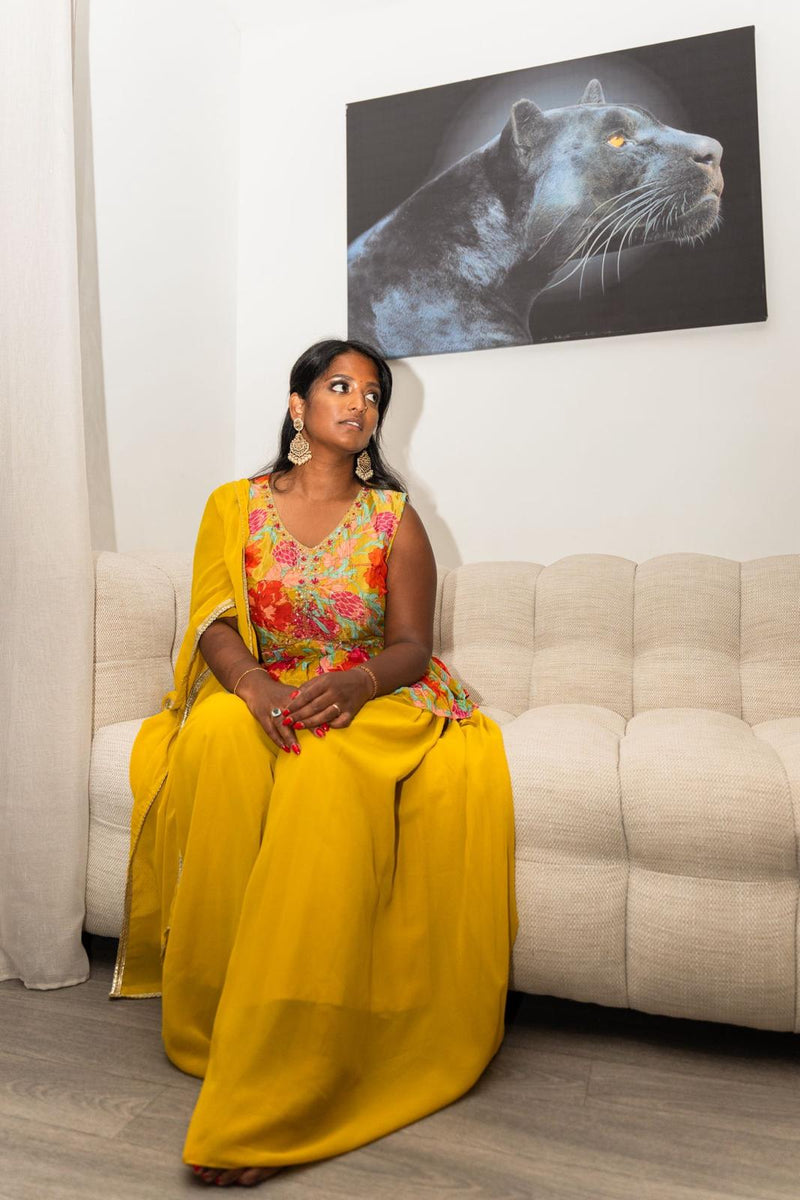 Yellow sharara set with a floral top