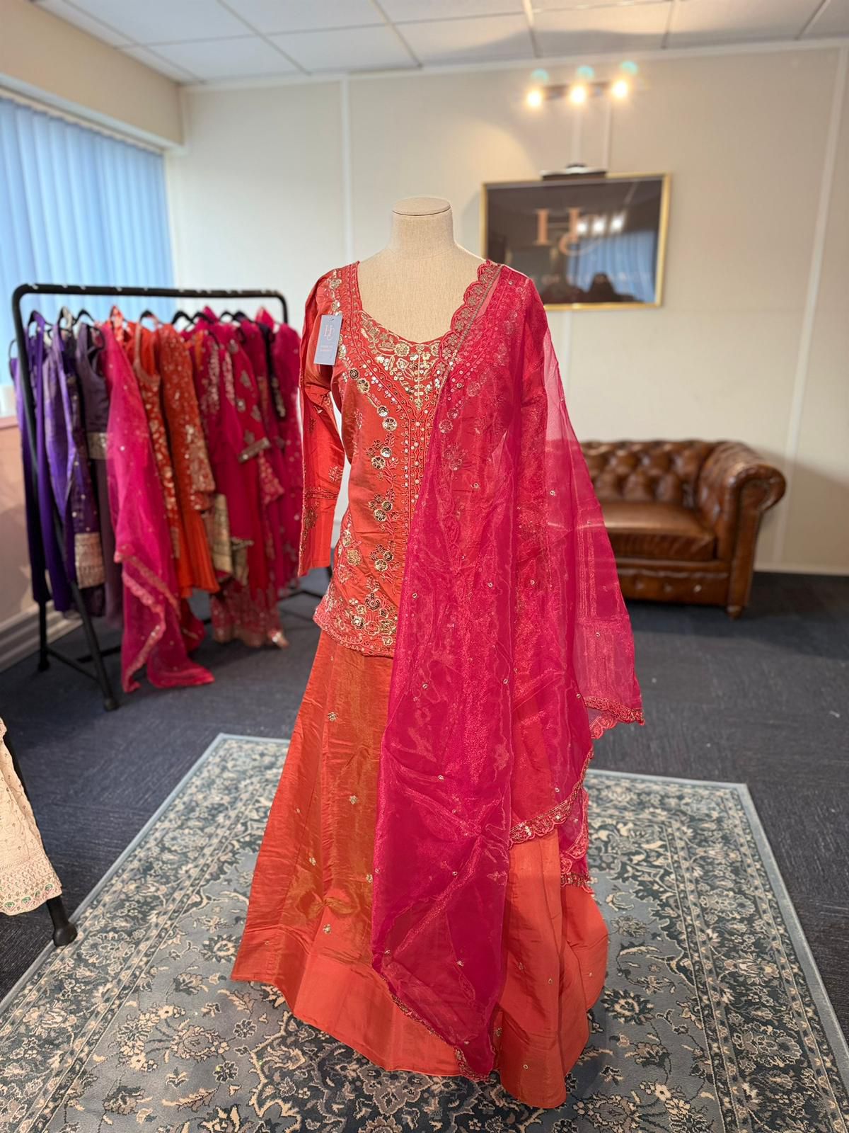 An orange and pink lehenga-style sharara