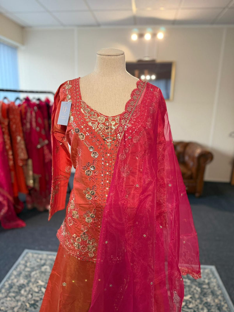 An orange and pink lehenga-style sharara