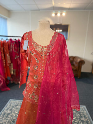An orange and pink lehenga-style sharara